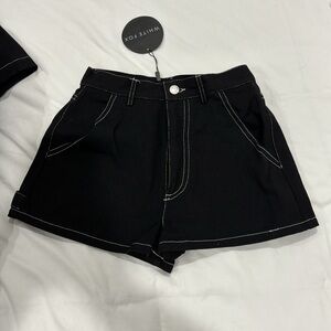 Black denim shorts
